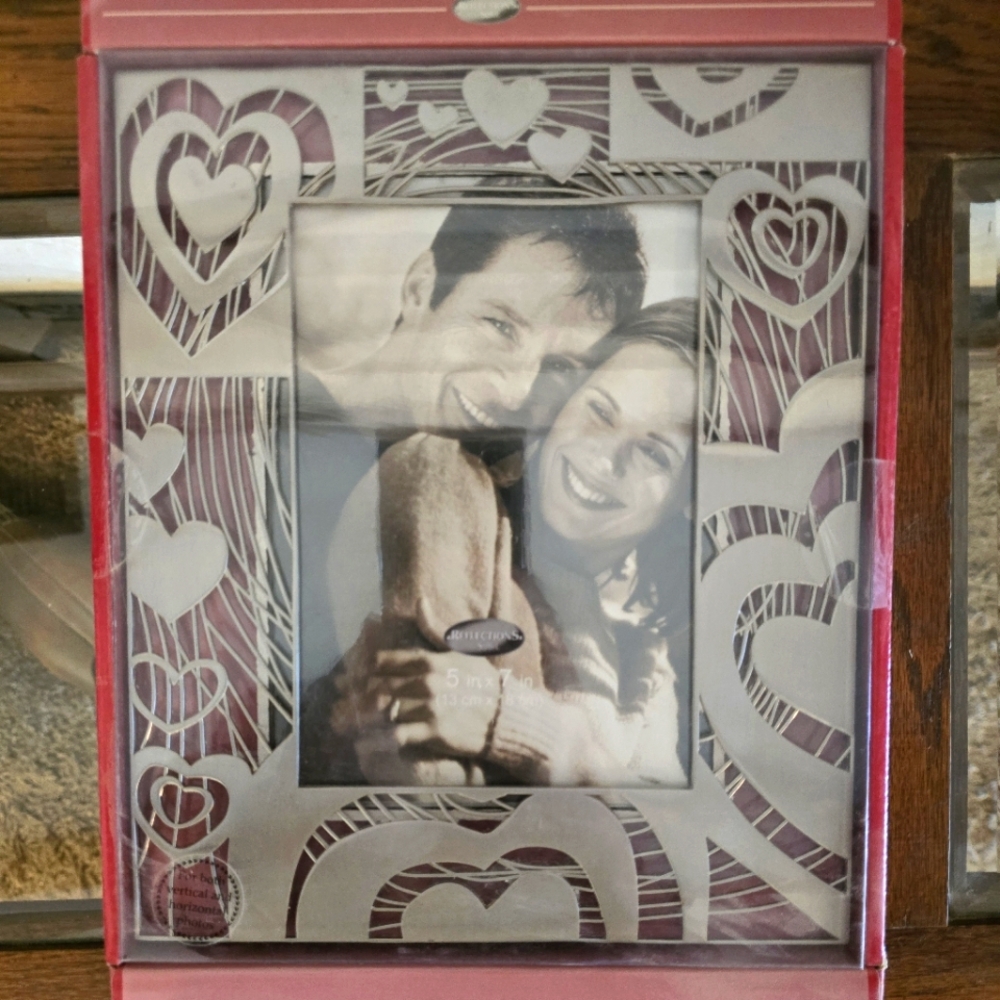 NEW Brushed nickel heart cut out frame.